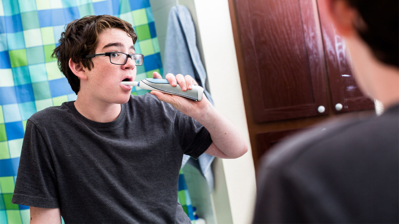 How to Help Your Teen Brushing Regularly - Hinsdale Dental